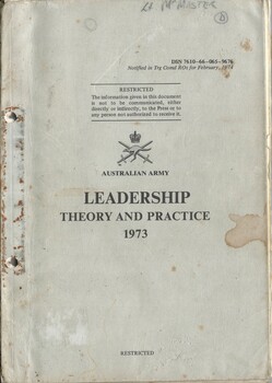 A greyish coloured cardboard cover with black information on the front. Top right hand corner is the name of Lt. McMaster. 