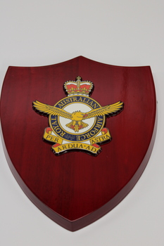 Royal Australian Airforce plaque with plastic insignia.