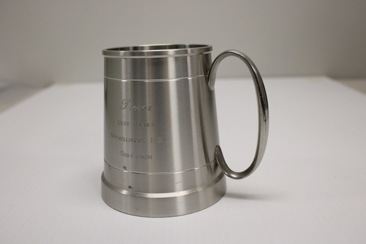 A pewter beer mug dedicated to Trevor Nicholson.