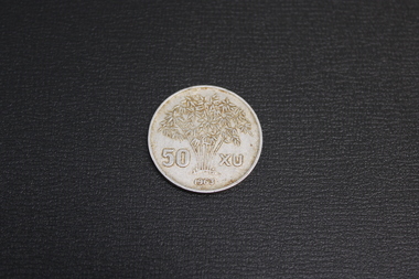 A 50xu Vietnamese aluminum coin.