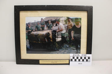 Photograph - U. S. Servicemen Recorering Ammuniton Fallen from