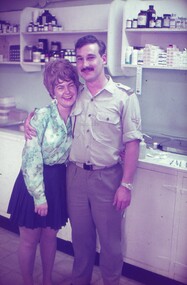 Cpl Sims posing with a female from the Australian Embassy.