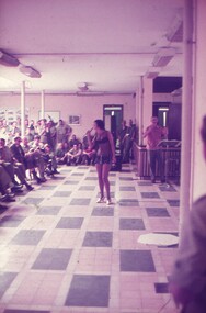 Female singing for soldiers.