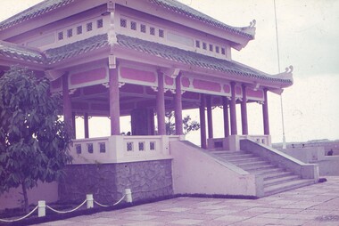 Vietnamese style architecture building in red, white and green.