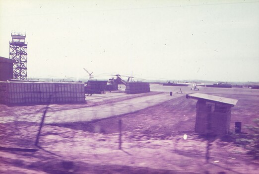 Helicopter pads with defensive walls, one containing a CH-54 Sky Crane.
