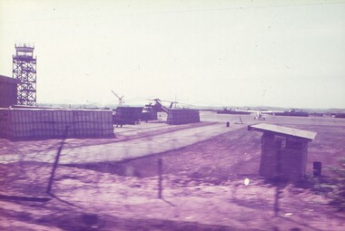 Helicopter pads with defensive walls, one containing a CH-54 Sky Crane.