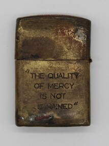 Small metal zippo lighter with inscription "The Quality of Mercy is Not Strained" 
