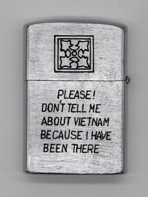 Small silver zippo lighter with text "Please Don't tell Me About Vietnam Because I Have Been There"