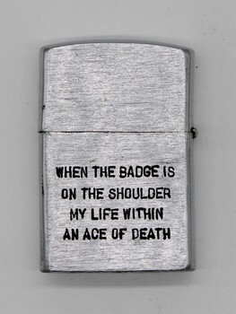 Small silver zippo lighter