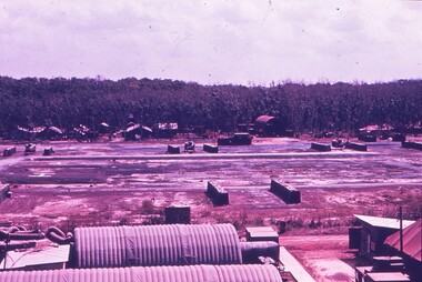 Fortified walls either side of helicopter pads for protection.