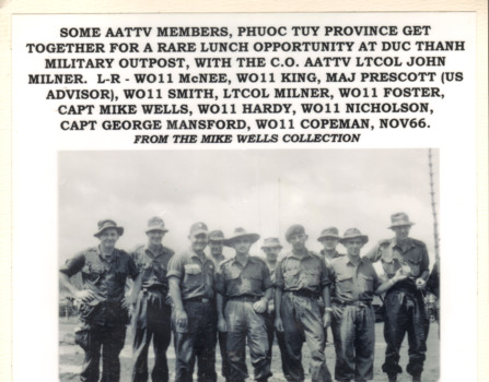 A copy of a black and white photograph of some AATTV members at Phuoc Tuy Province in Nov 66