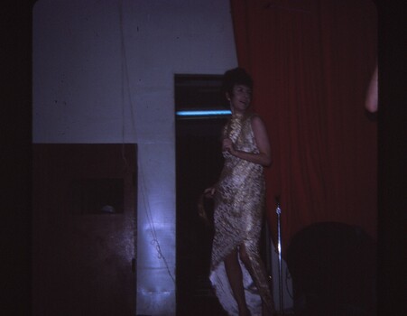 Female entertainer with tambourine.
