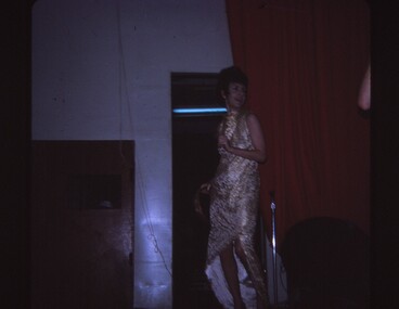 Female entertainer with tambourine.