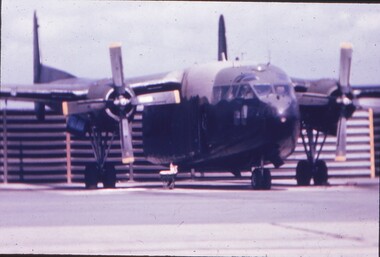 Aircraft parked in fortified bay,