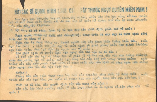 On tan paper with a blue heading and information below and on the reverse in Vietnamese