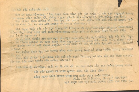 On tan paper with a blue heading and information below and on the reverse in Vietnamese