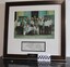 Framed photo of 21 delegates.