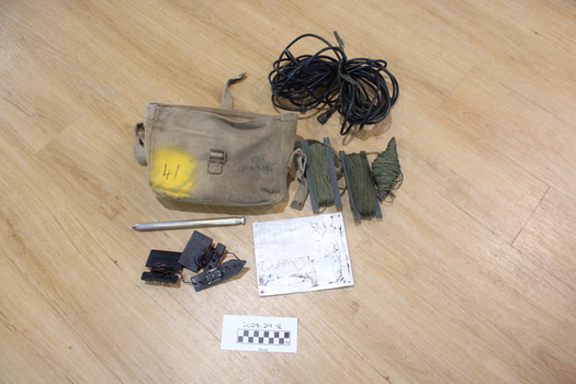 Canvas bag containing radio accessories items used soldiers in Vietnam.