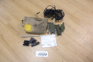Canvas bag containing radio accessories items used soldiers in Vietnam.