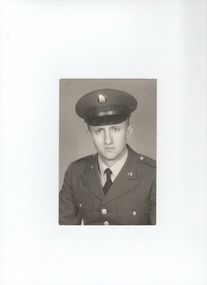 Sepia coloured photo of Tschappat , Lawrence E in United States Army uniform.