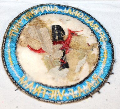 The back of the patch with paper left from transfer.