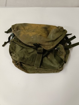 Green army issue duffel bag with four (4) compartments.