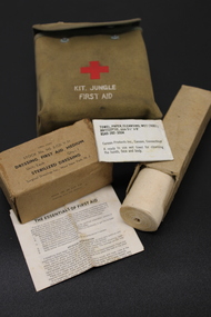 Canvas pouch with first aid supplies used in the jungle.