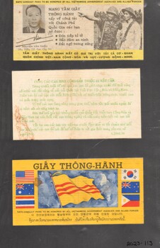 Three small coloured documents fixed onto a black cardboard in Vietnamese