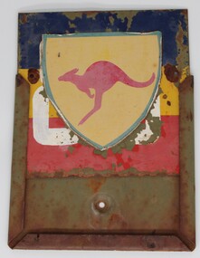 A metal holder with a sliding insert depicting a kangaroo on a yellow shield. 