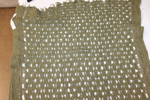 Open weaved, khaki army issue sweat rag.