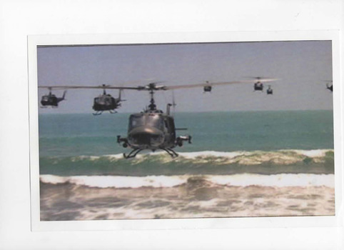 Coloured photo of helicopters in formation.