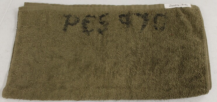 Olive green army issue cotton hand towel.