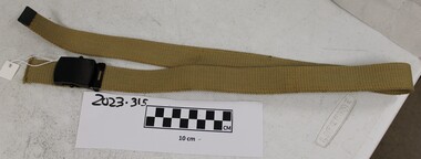 Woven material, heavy duty belt with black metal buckle.