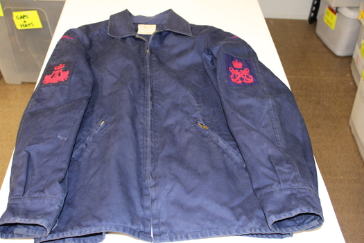 Australian Navy lined jacket. Blue in colour, long sleeves with red patches on left and right sleeve. 