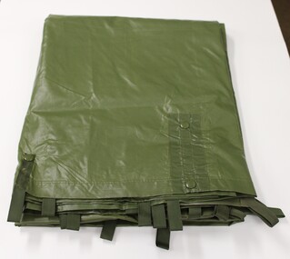 A waterproof shelter known as a hoochie used by the military.