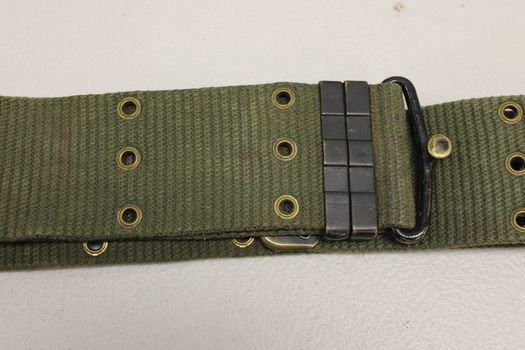 Khaki webbed belt with brass buckle, metal clamps and brass eyelets.