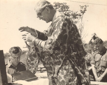 A Black and White Photograph of a Padre/Chaplain 
