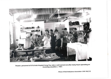 Photo of hospital theatre after many hours operating on incoming wounded. 1967