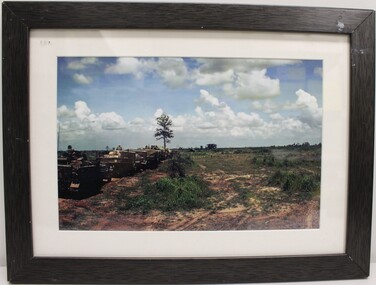 A Framed Coloured Photograph of Several Vehicles in a Convoy