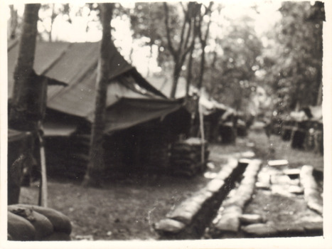 A Black and White Photograph of a Tent