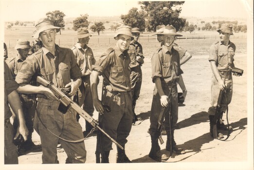 A Black and White Photograph of Several Soldiers on a Parade Ground