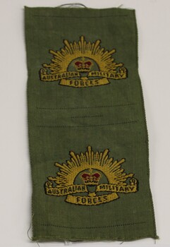 A khaki material patch of the Australian Military Force emblem.