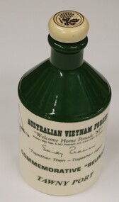 Ceramic flagon commemorating "Welcome Home Parade" '87.