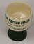 Small ceramic drinking vessel.
