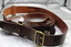Wide leather army issue belt.
