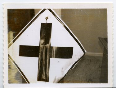 Crossing Road Sign damaged by vandals
