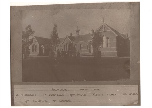 Seven staff members in front of Buninyong State School circa 1896
