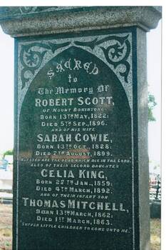 Colour photo, polished granite headstone, engraved, with Triangular decorative pelmet, for Robert and Celia Scott and two of their children.