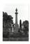 A B/W photo, cemetery, monument, polished granite, pillar on engraved plinth, urn cap, cast iron fence, other monuments and trees in background.