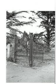 Buninyong Cemetery gates with cypress trees in background